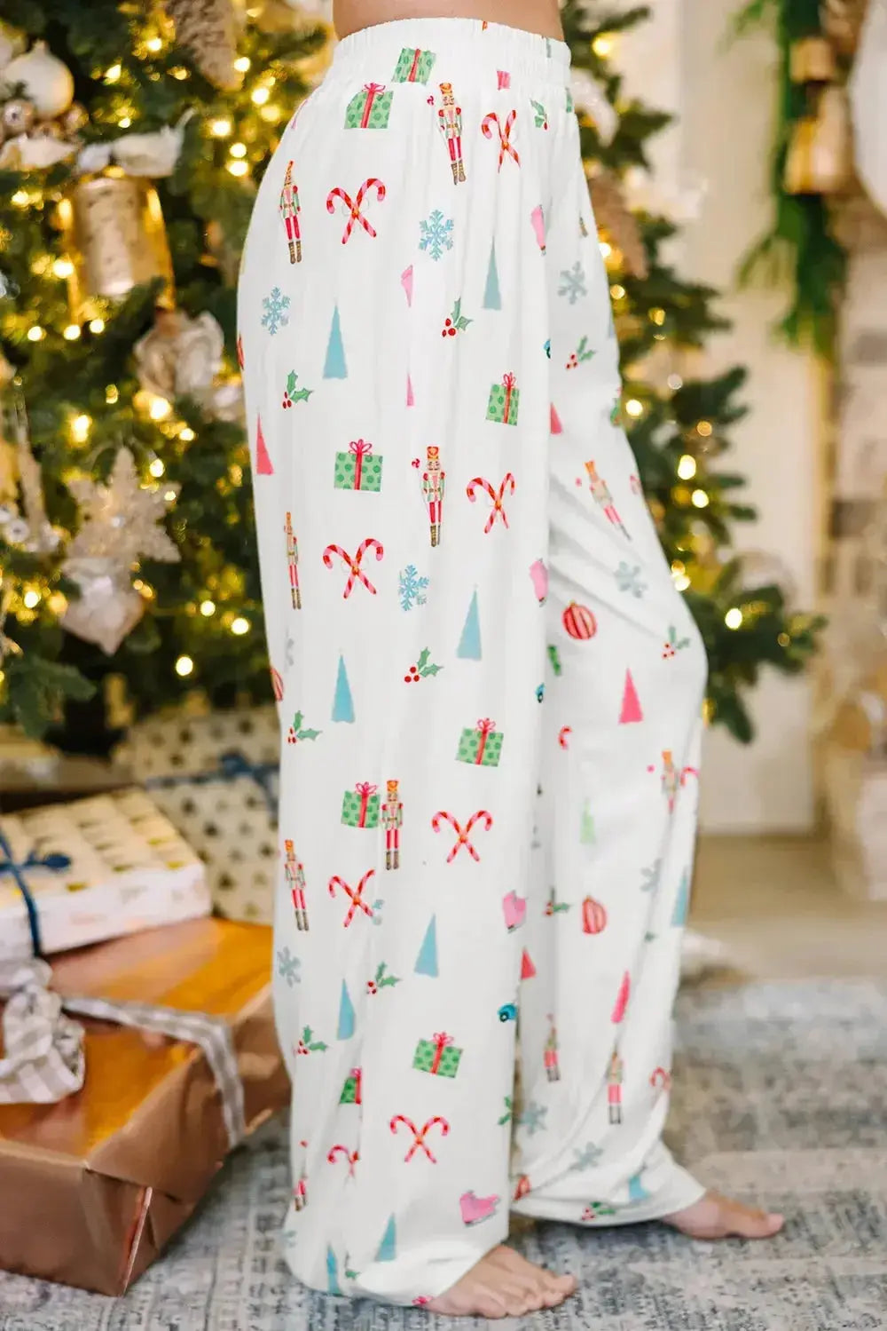 Women's Christmas print long sleeve collared pajama lounge set by Plush Fashion Hub, featuring festive holiday-themed pajamas.