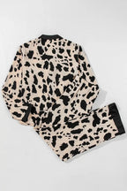 Women's classic button-down long sleeve pajama set by Trendsi, soft lounge wear with comfortable fit and cozy fabric.