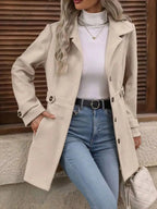 Women's classic button-front long-sleeve layering coat, transitional outerwear by Trendsi, suitable for versatile seasonal wear.