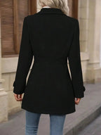 Women’s classic button-front long sleeve layering coat, transitional outerwear by Trendsi, shown in a neutral color.