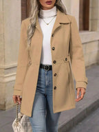 Women’s classic button-front long sleeve layering coat, transitional outerwear by Trendsi, shown in a versatile, stylish design.