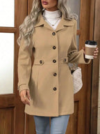 Women's classic button-front long sleeve layering coat, stylish transitional outerwear by Trendsi, ideal for cool weather.