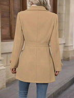 Women's classic button-front long sleeve layering coat, versatile transitional outerwear by Trendsi, shown in a neutral fabric.