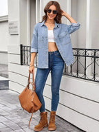 Women’s classic long sleeve denim shirt by Trendsi, made of premium cotton blend, featuring button-up front and casual denim style.