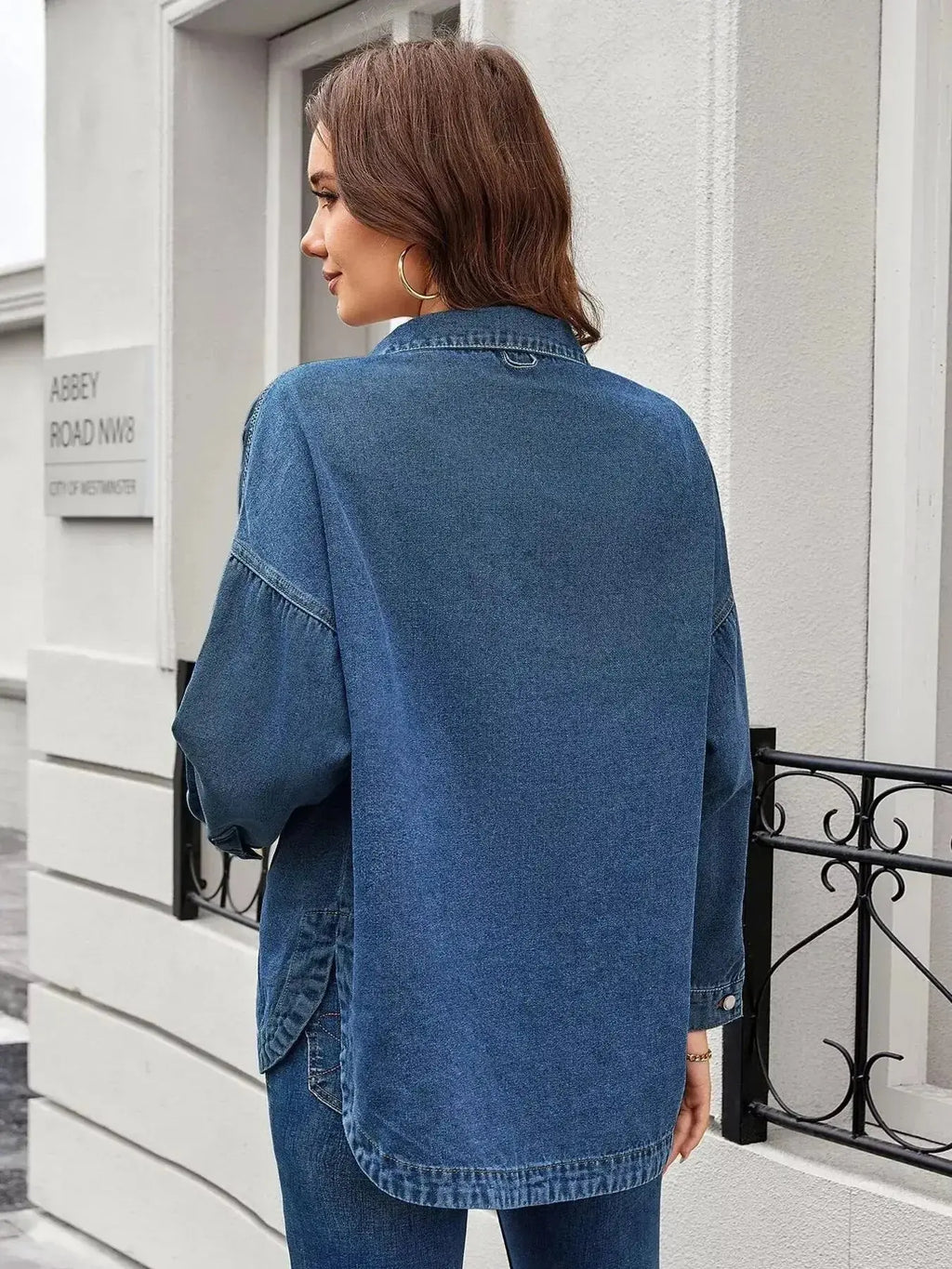 Women’s classic long sleeve denim shirt by Trendsi, made from premium cotton blend, featuring button-up style and casual fit.