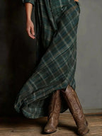 Women's classic plaid maxi dress with button-down front and pockets, by Trendsi, featuring a stylish and comfortable design.
