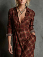 Women's classic plaid button-down maxi dress with pockets by Trendsi, featuring a relaxed fit and timeless plaid pattern.