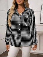 Women's classic striped long sleeve button-up shirt by Trendsi, ideal for versatile office wear, featuring a stylish and timeless design.