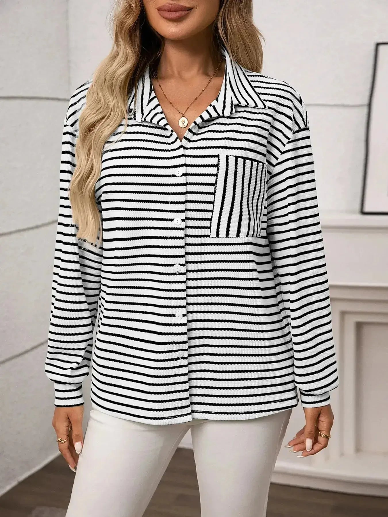 Women’s classic striped long sleeve button-up shirt by Trendsi, versatile office wear, featuring a tailored fit and button front.