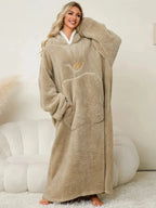 Women's contrast hooded lounge dress with long sleeves and pockets, made by Trendsi, perfect for cozy pajama wear.