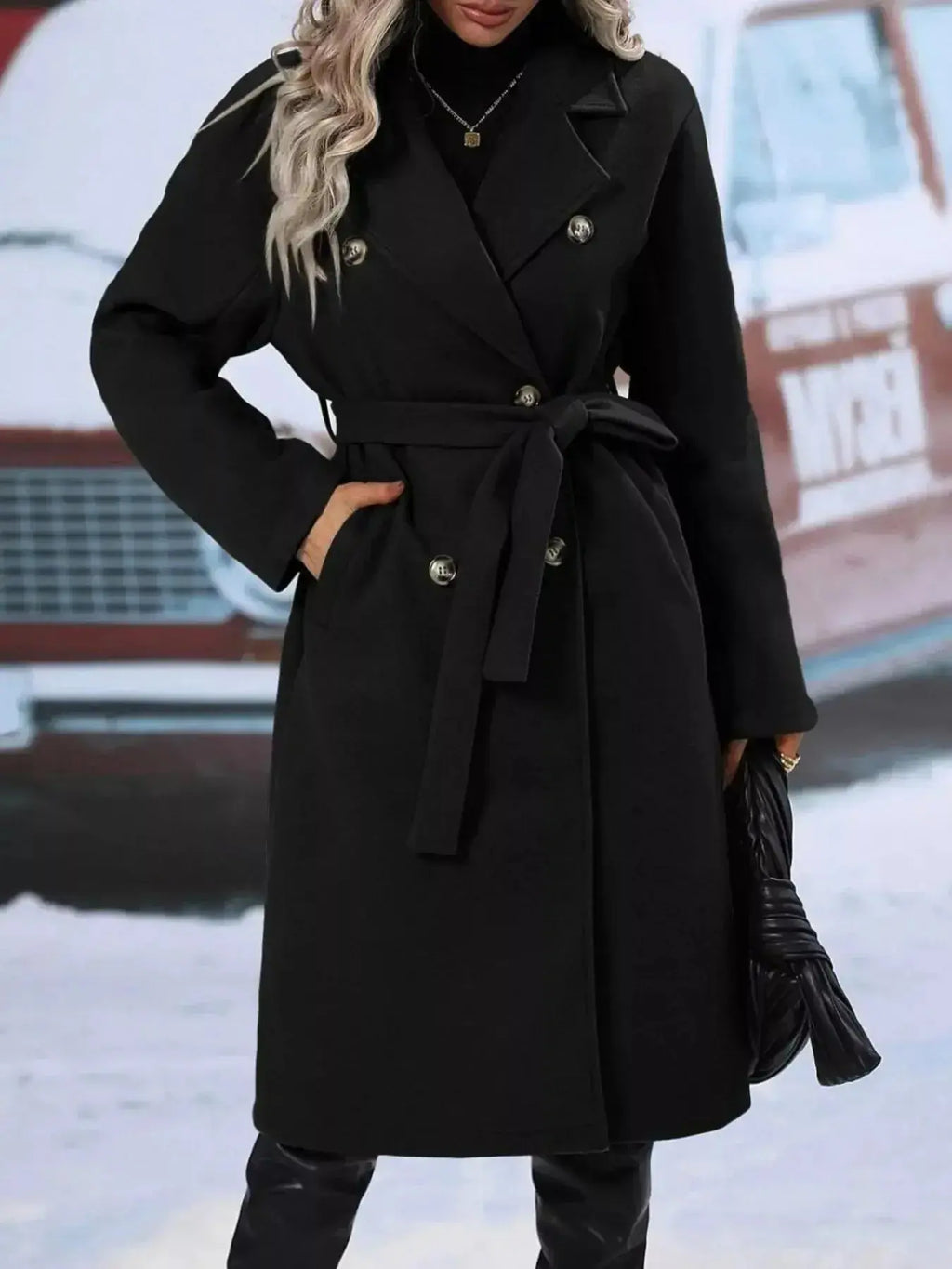 Women's double-breasted trench coat with tie waist belt, stylish outerwear by Trendsi, shown on a model.
