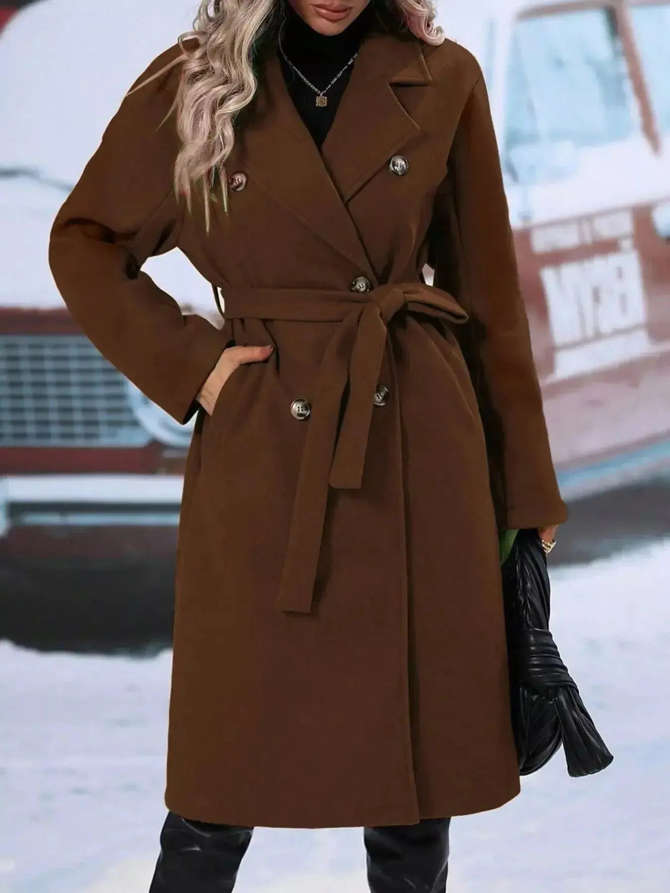 Women's double-breasted trench coat with tie waist belt, stylish outerwear from Trendsi, shown hanging with classic collar and belted waist.