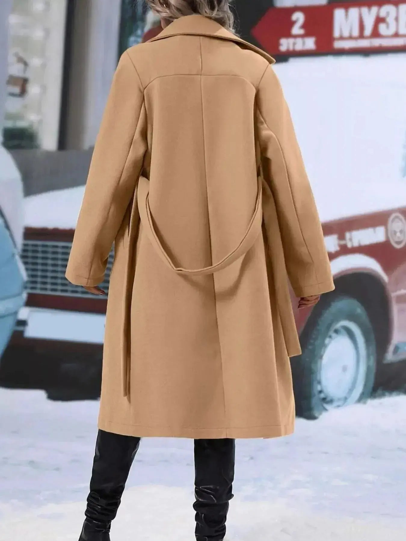 Women’s double-breasted trench coat with tie waist belt, stylish outerwear from Trendsi, shown on a model.