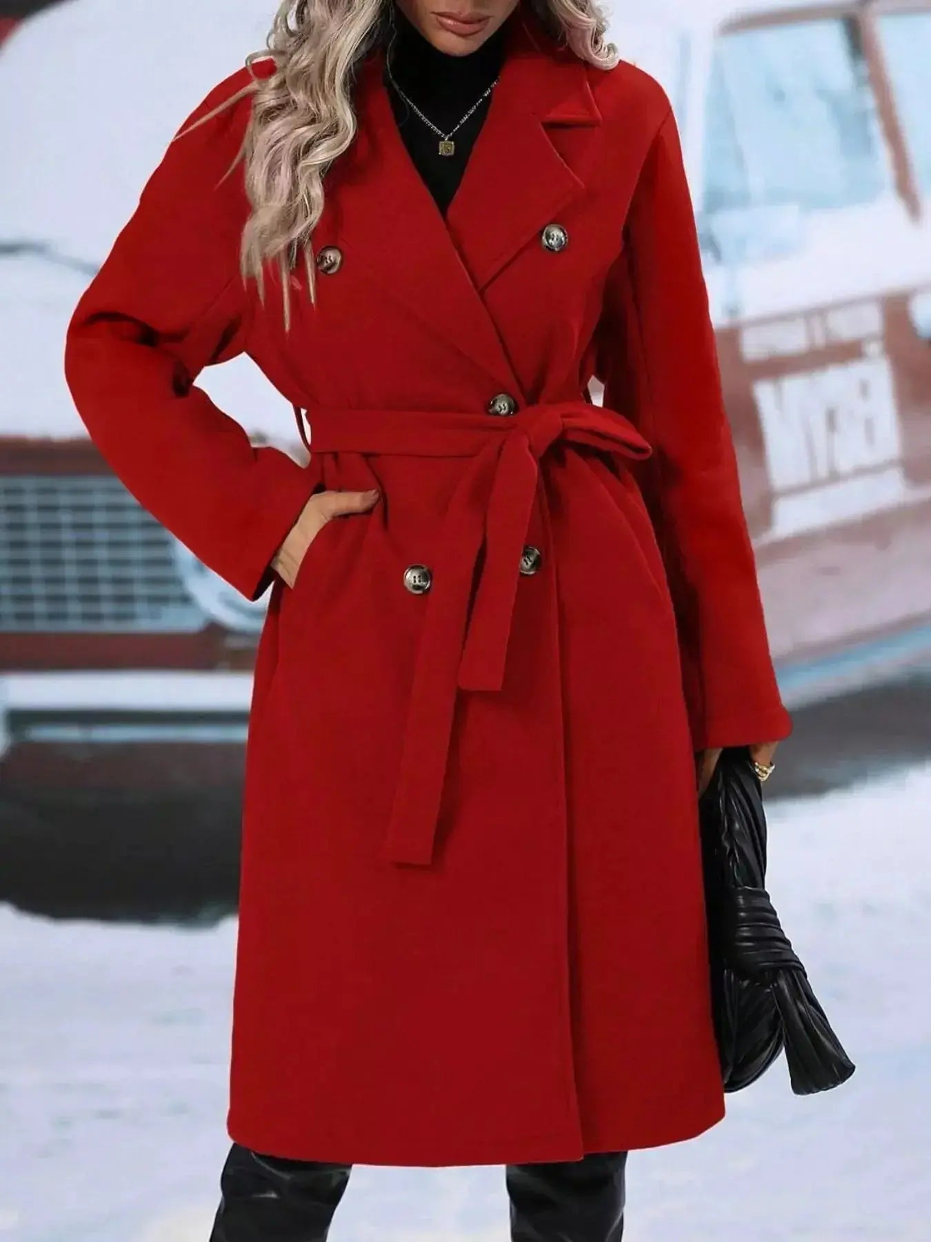Women's double-breasted trench coat with tie waist belt, stylish outerwear from Trendsi, shown hanging on a clothing rack.