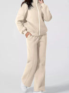 Women's drop shoulder zip-up jacket and jogger sweat suit from Trendsi, two-piece lounge set, comfortable casual wear.