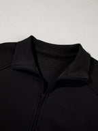 Women's drop shoulder zip-up jacket and jogger lounge set, stylish sweat suit from Trendsi, casual two-piece outfit.