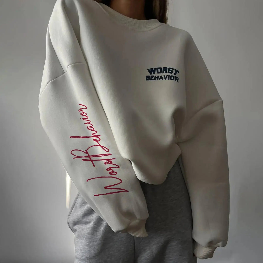 Women wearing a soft round neck casual sweater by Plush Fashion Hub, featuring a cozy fit and smooth fabric in a relaxed style.
