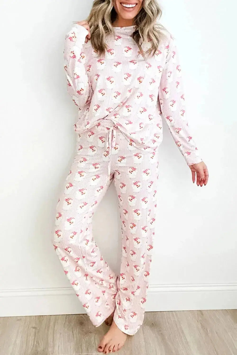 Women's festive Santa print long sleeve pajamas lounge set by Plush Fashion Hub, featuring holiday-themed cozy sleepwear.