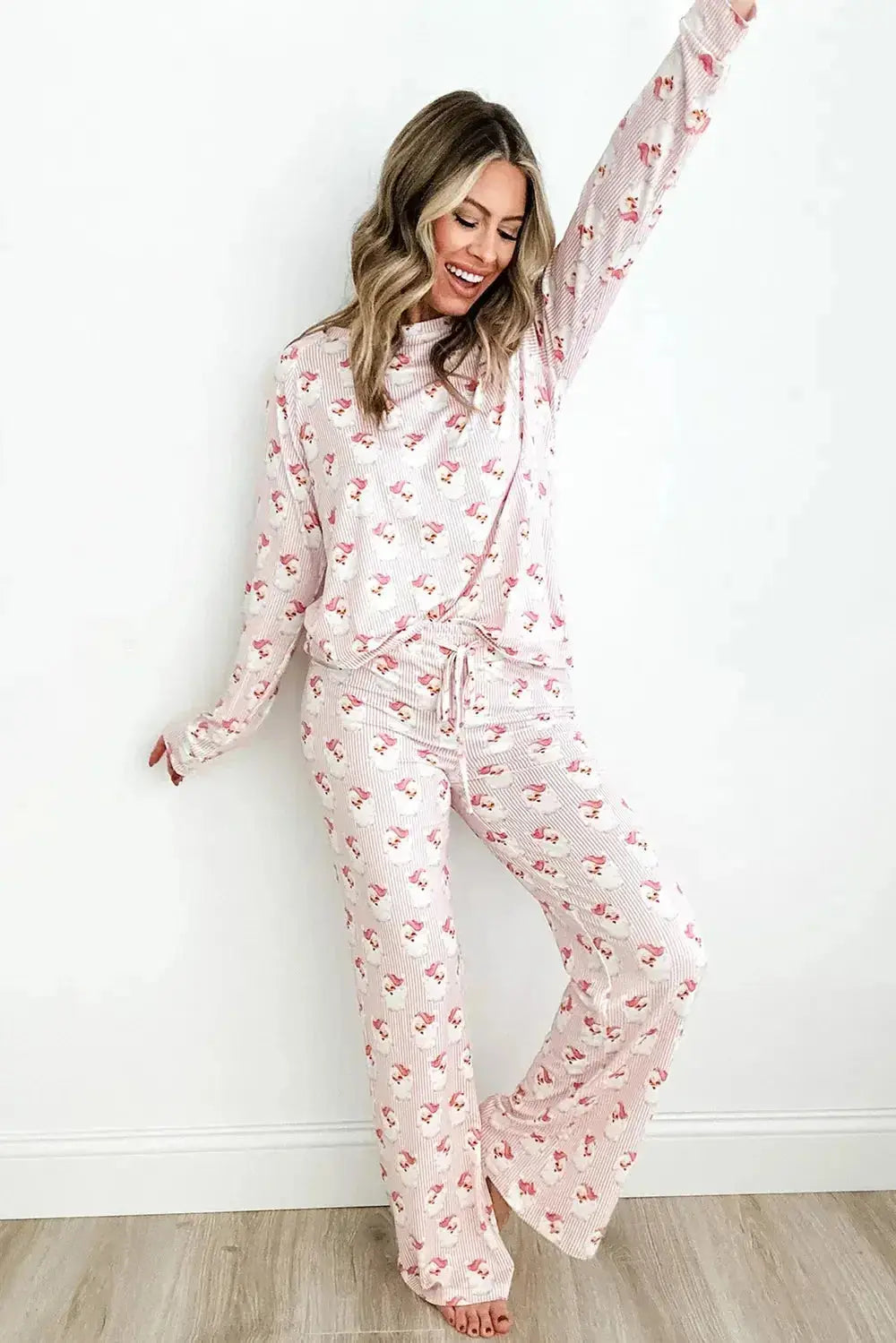 Women’s Santa print long sleeve pajamas lounge set by Plush Fashion Hub, featuring festive holiday-themed design and comfortable fit.