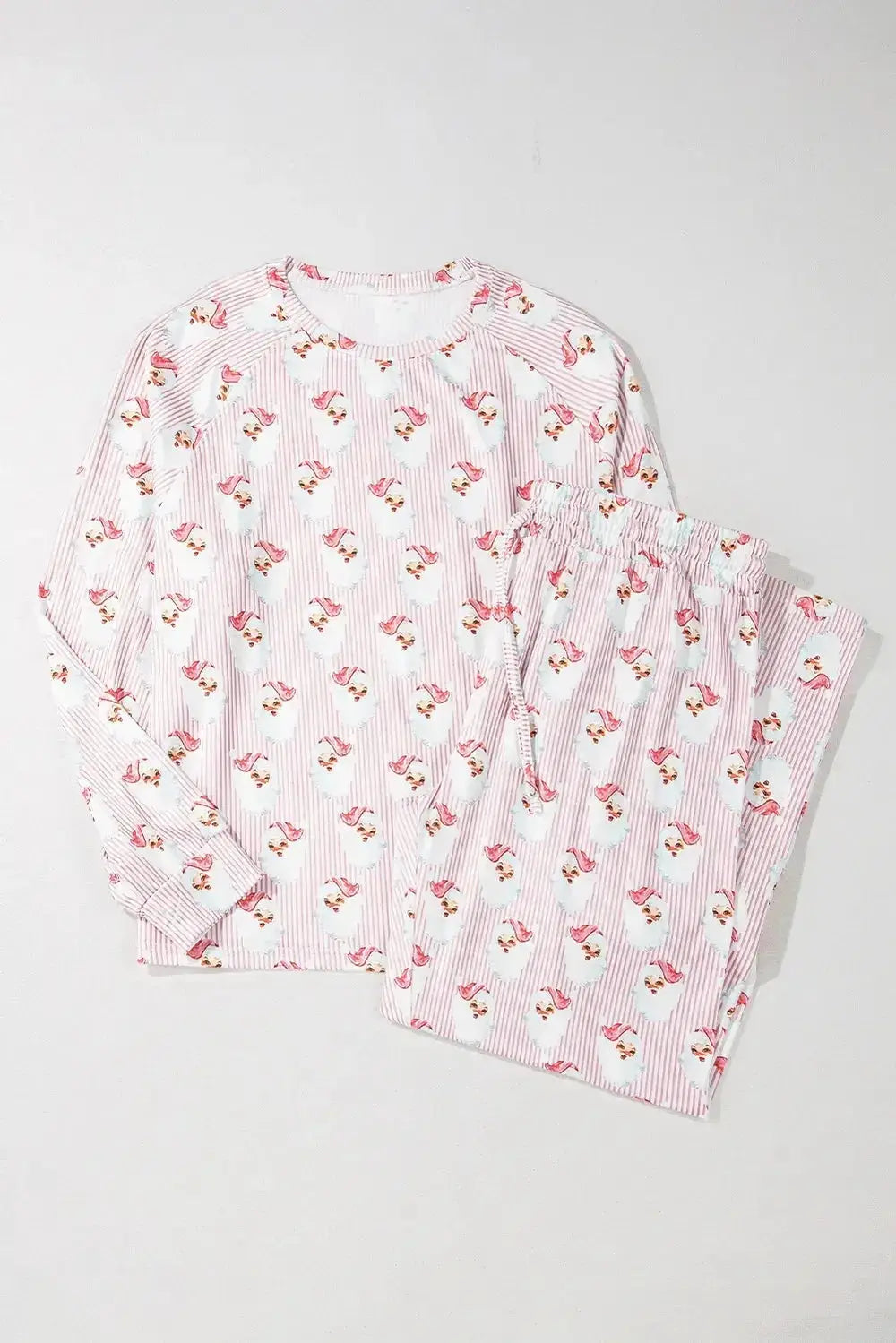Women’s festive Santa print long sleeve pajama lounge set by Plush Fashion Hub, featuring cozy holiday-themed pajamas.