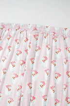Women's festive Santa print long sleeve pajama lounge set by Plush Fashion Hub, featuring cozy holiday-themed pajamas.