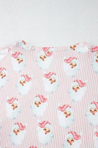 Women's festive Santa print long sleeve pajamas lounge set by Plush Fashion Hub, featuring cozy holiday-themed sleepwear with Santa design.