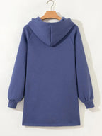 Women's fleece-lined oversized tunic hoodie with drawstring hood, trendy and cozy casual hoodie by Trendsi.