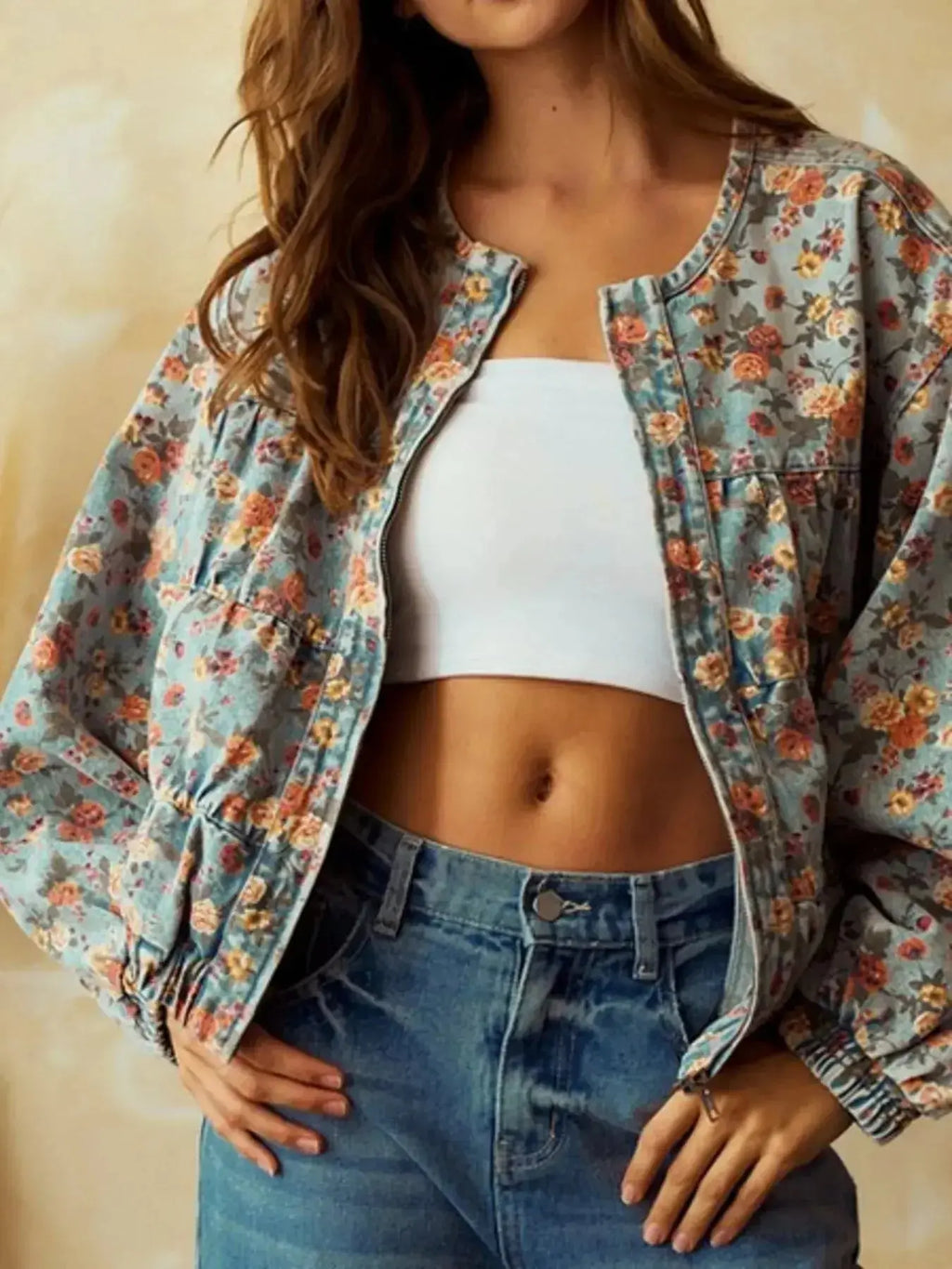 Women’s floral print cropped denim jacket by Trendsi, featuring a zip-up design and cotton blend utility coat style.