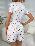 Women’s floral ruched lounge set with lightweight v-neck top and matching shorts by Plush Fashion Hub.
