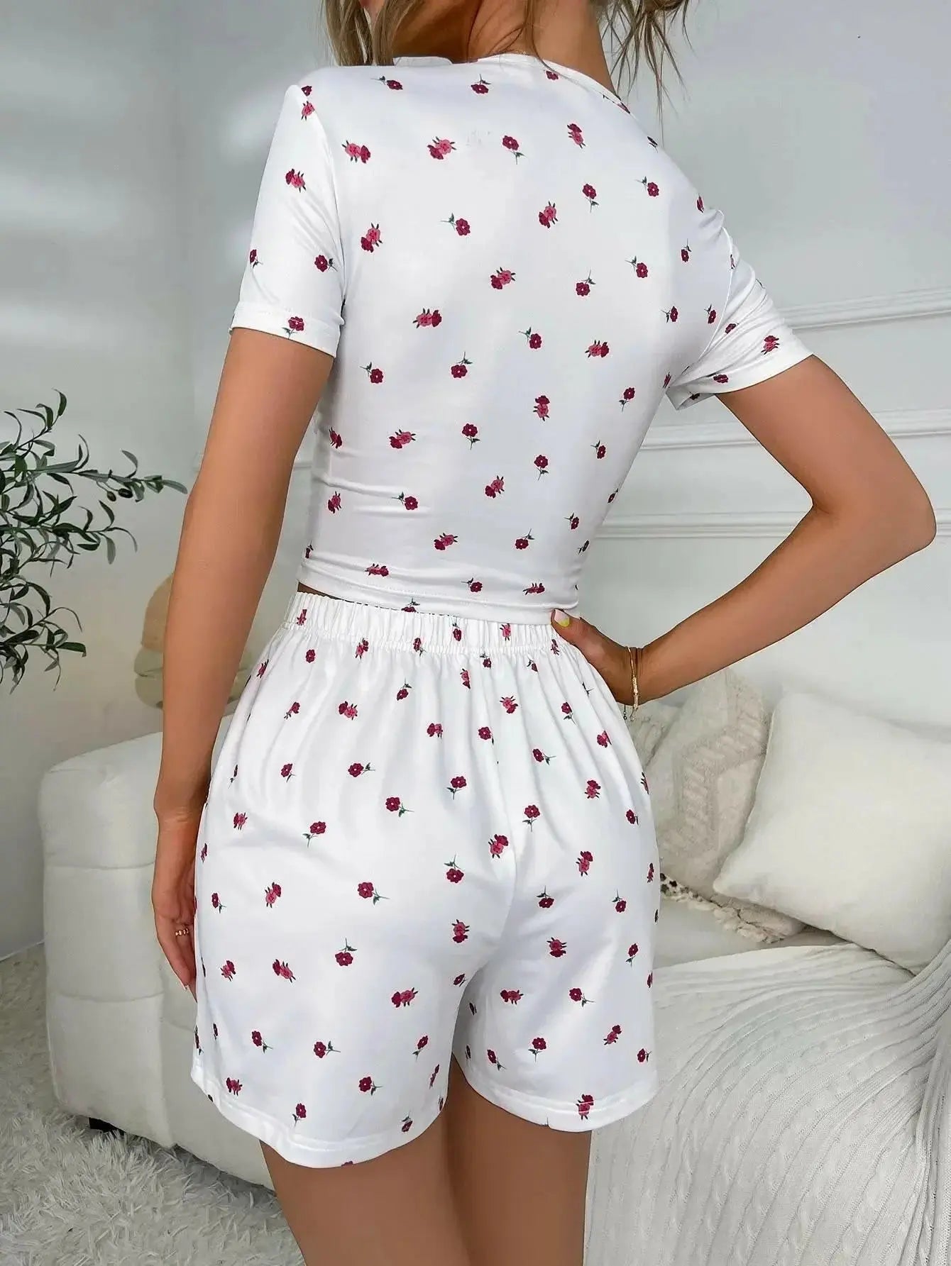 Women’s floral ruched lounge set with lightweight v-neck top and matching shorts by Plush Fashion Hub.