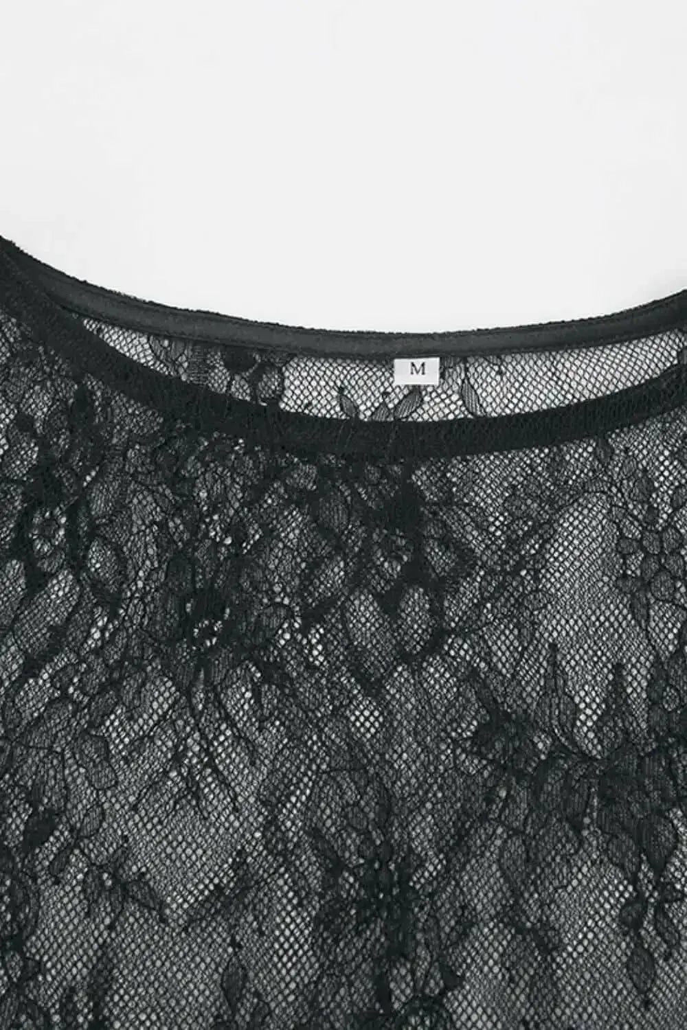 Women's fringe lace sheer long sleeve blouse with floral pattern, elegant top by Plush Fashion Hub.