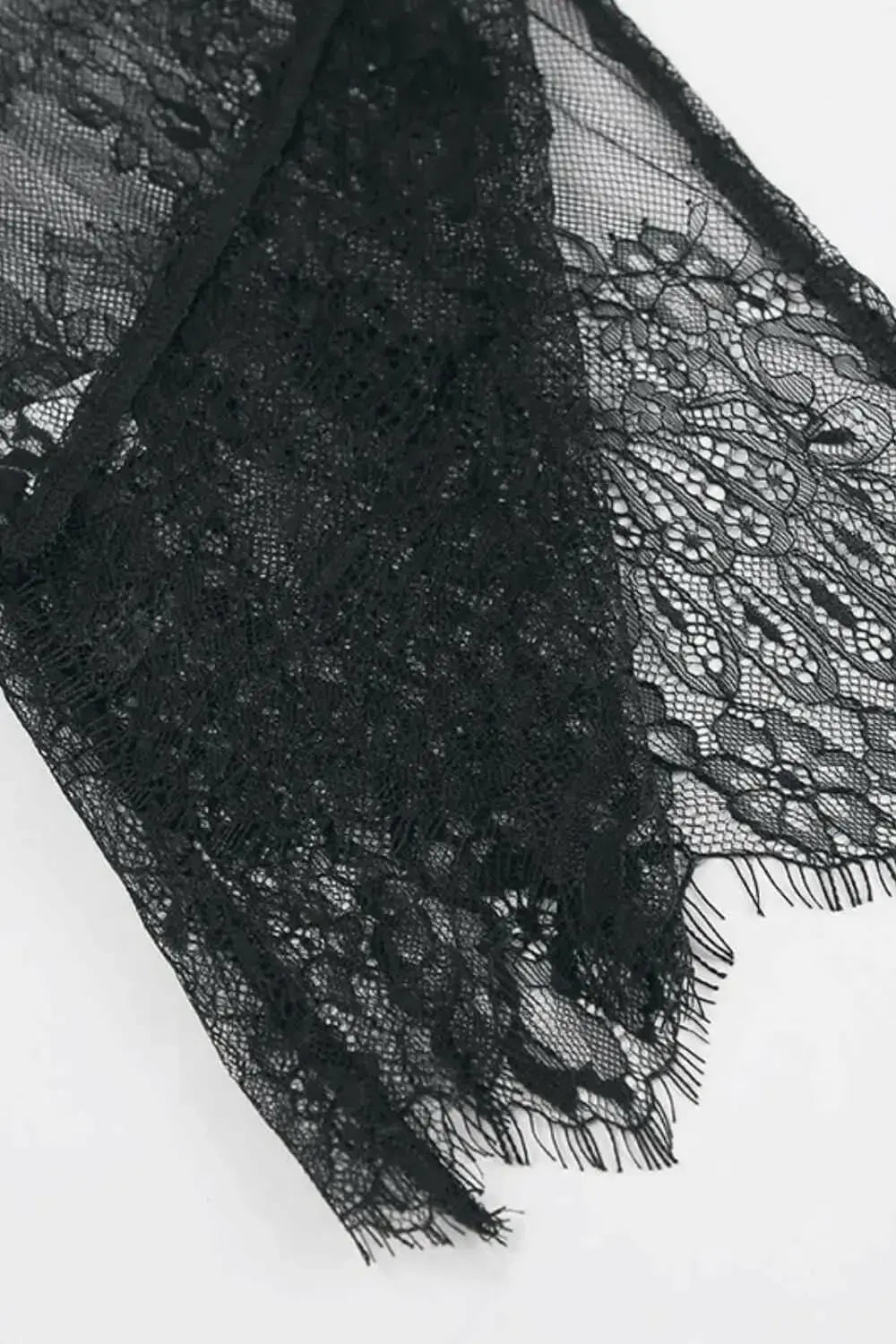 Women's fringe lace sheer long sleeve blouse with floral pattern, elegant top from Plush Fashion Hub