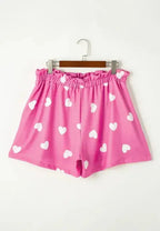 Women’s heart print long sleeve pajama set with elastic waist shorts, stylish and comfortable sleepwear from Trendsi.