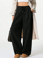 Women’s high-waisted wide-leg drawstring lounge pants by Trendsi, featuring a relaxed fit and comfortable casual style.