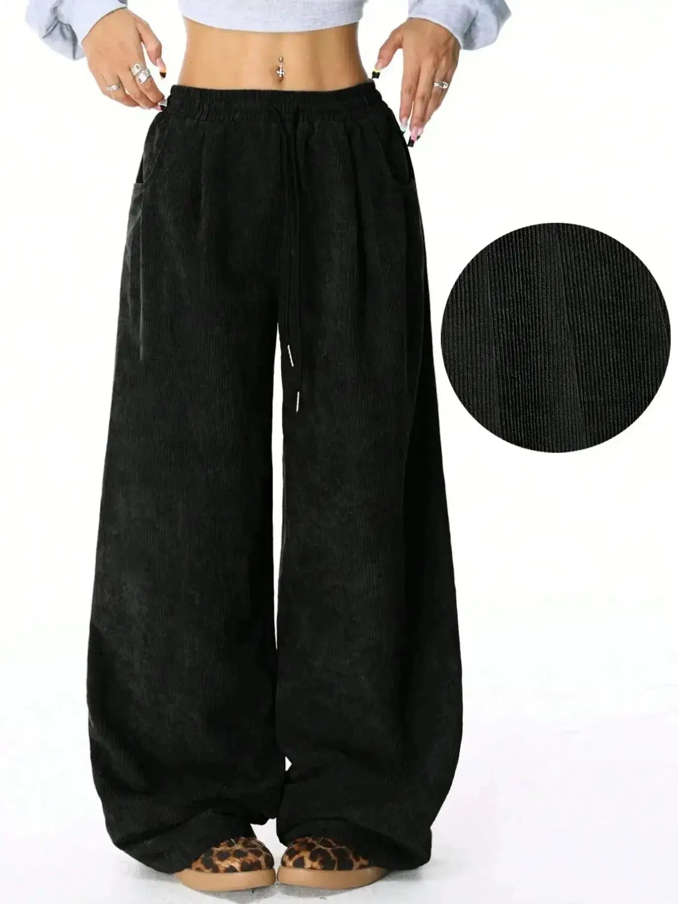 Women’s high-waisted wide-leg lounge pants with drawstring waistband, casual and comfortable for everyday wear.