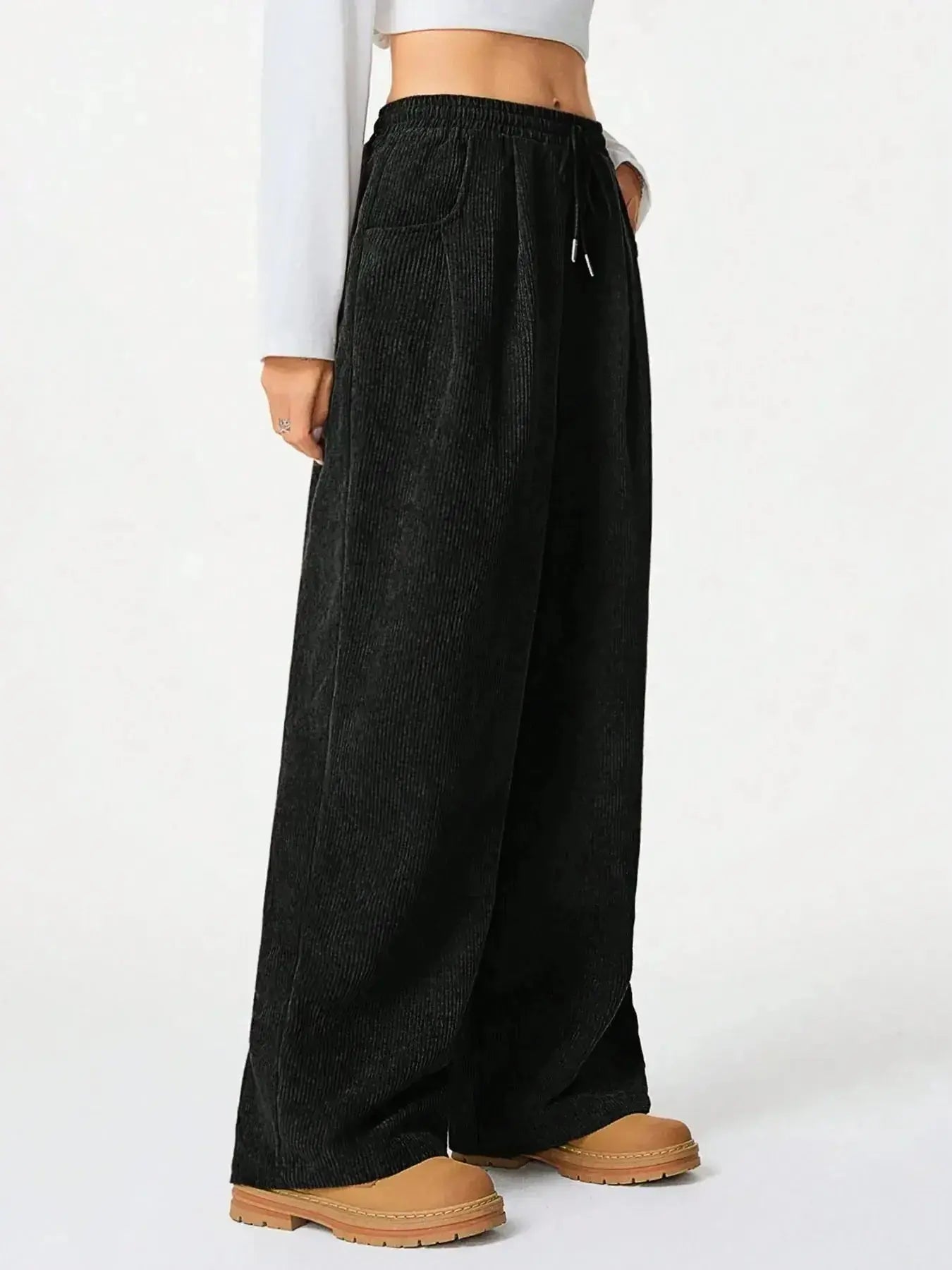 Women’s high-waisted wide-leg lounge pants with drawstring waist from Trendsi, perfect for comfortable casual wear.