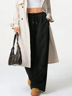 Women’s high-waisted wide-leg drawstring lounge pants by Trendsi, featuring a relaxed fit and comfortable casual style.