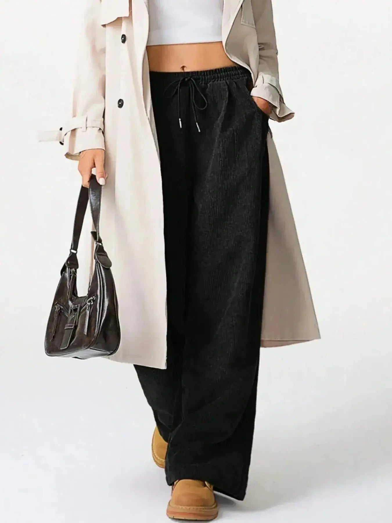 Women’s high-waisted wide-leg drawstring lounge pants by Trendsi, featuring a relaxed fit and comfortable casual style.