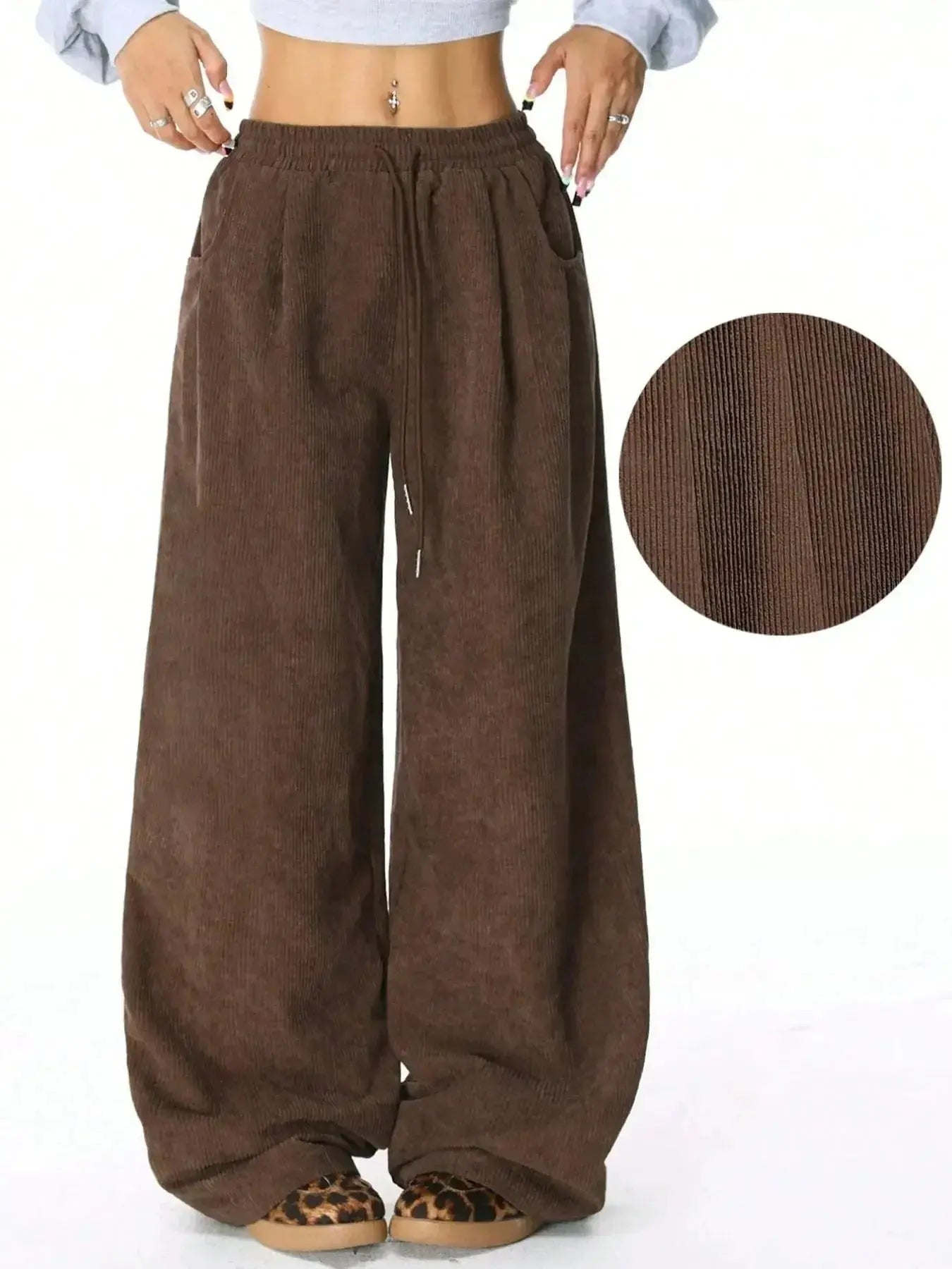 Women’s high-waisted wide-leg lounge pants with drawstring waist, casual and comfortable, from Trendsi.