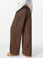 Women’s high-waisted wide-leg lounge pants with drawstring, casual and comfortable, from Trendsi.