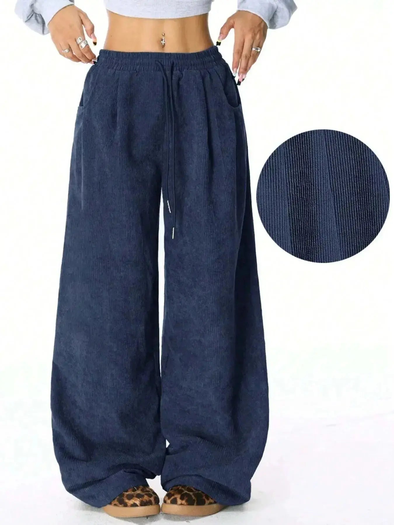 Women’s high-waisted wide-leg drawstring lounge pants from Trendsi, featuring a relaxed fit and comfortable casual style.