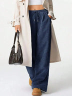 Women’s high-waisted wide-leg drawstring lounge pants by Trendsi, featuring a comfortable casual fit and relaxed style.