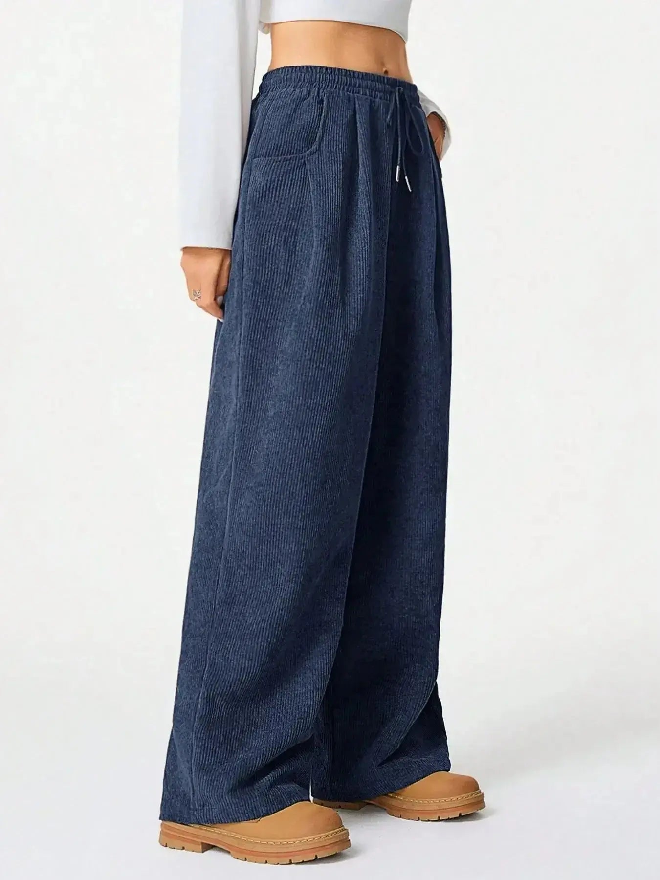 Women’s high-waisted wide-leg lounge pants with drawstring waistband, casual and comfortable wear by Trendsi.