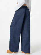 Women’s high-waisted wide-leg lounge pants with drawstring waist, casual and comfortable, from Trendsi.
