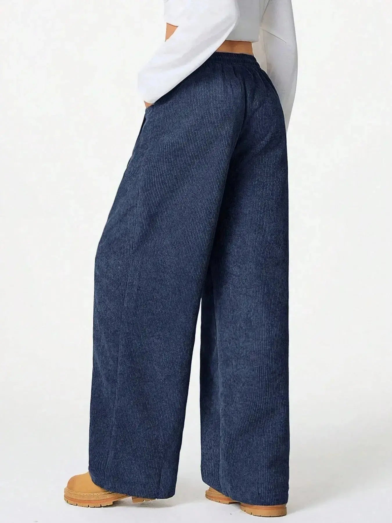 Women’s high-waisted wide-leg lounge pants with drawstring waist, casual and comfortable, from Trendsi.