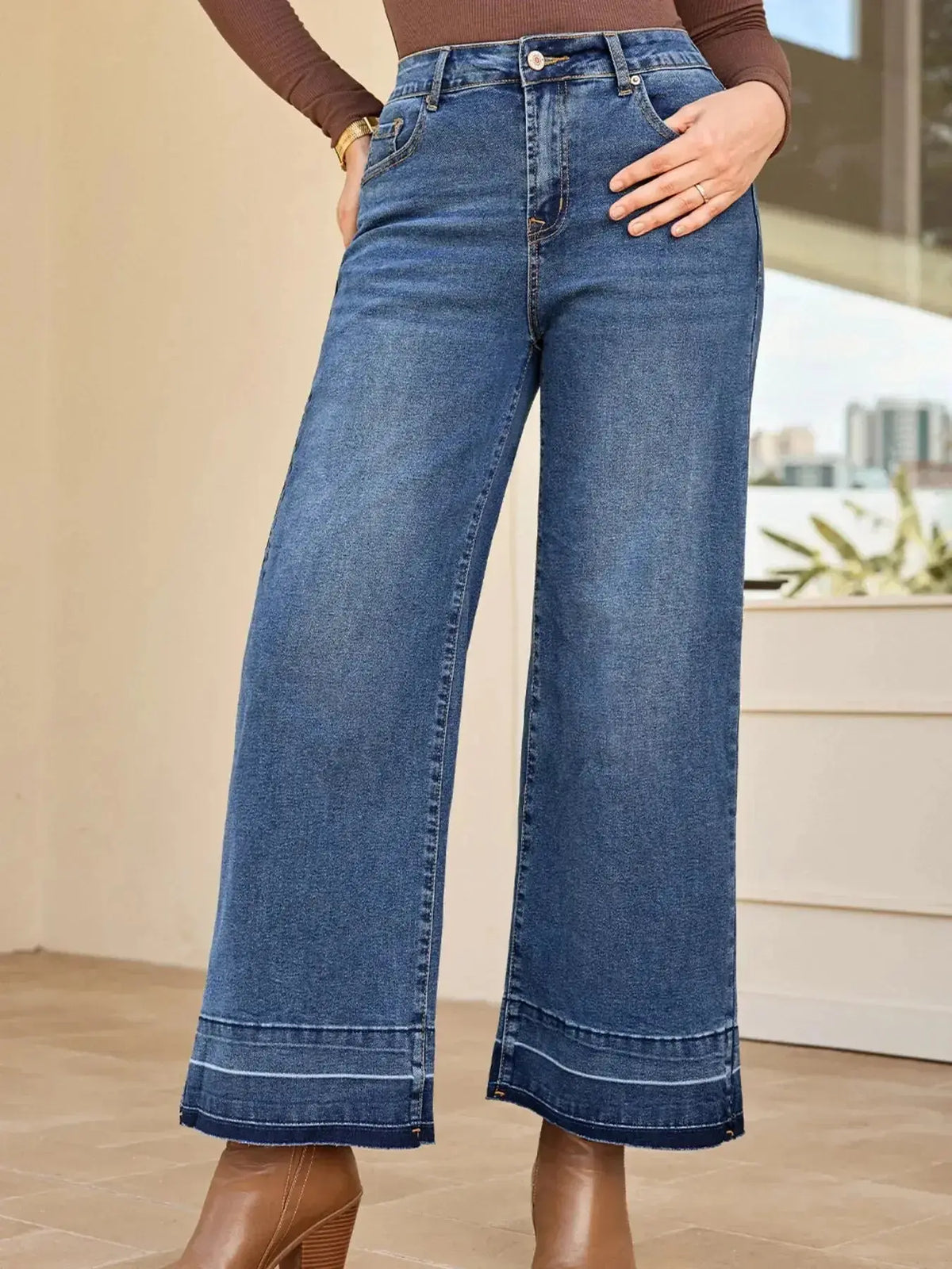 Women’s high-waisted wide-leg washed denim jeans by Plush Fashion Hub featuring a classic relaxed fit and trendy style.