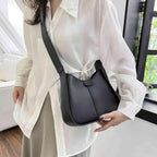 Women’s textured vegan leather crossbody handbag by Plush Fashion Hub, versatile shoulder purse with high-end design and stylish detail.