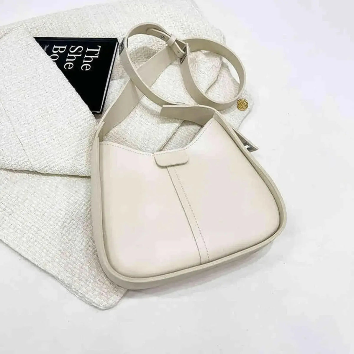 Women textured vegan leather crossbody handbag with versatile shoulder strap, stylish purse from Plush Fashion Hub.