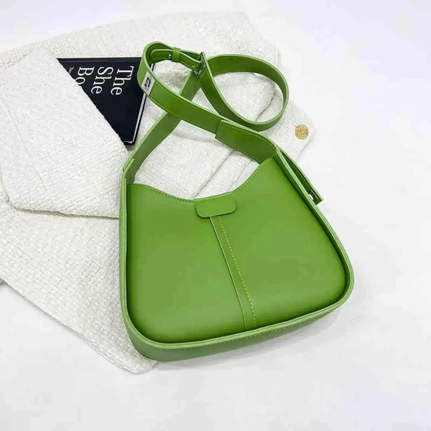 Women's textured vegan leather crossbody handbag with a sleek design, versatile shoulder purse from Plush Fashion Hub.