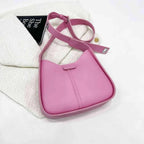 Women’s textured vegan leather crossbody handbag with a versatile shoulder strap, by Plush Fashion Hub.
